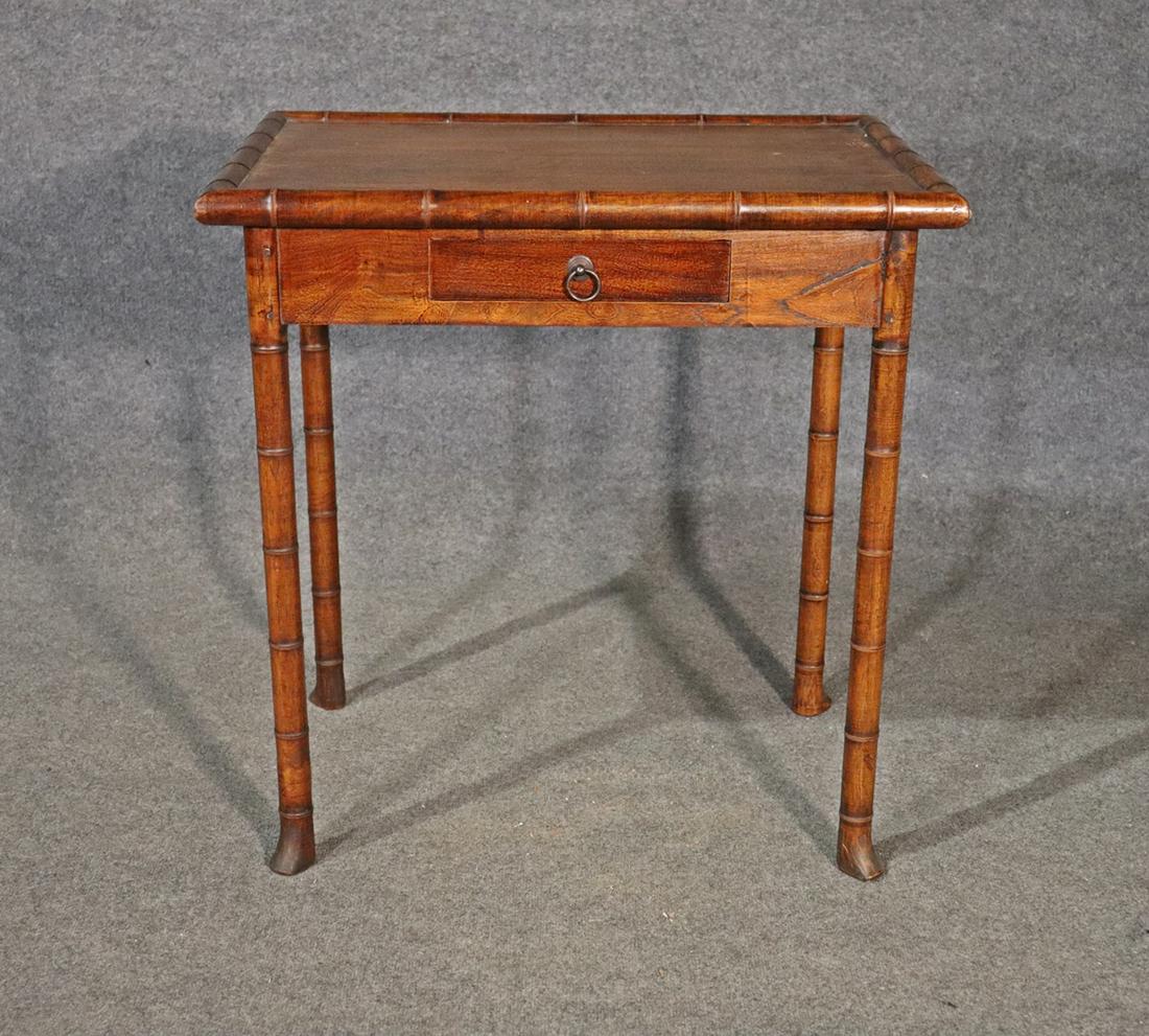 CARVED FAUX BAMBOO DESK: Carved wood. One drawer. 31" h x 29 1/2" w x 19 3/4" d.