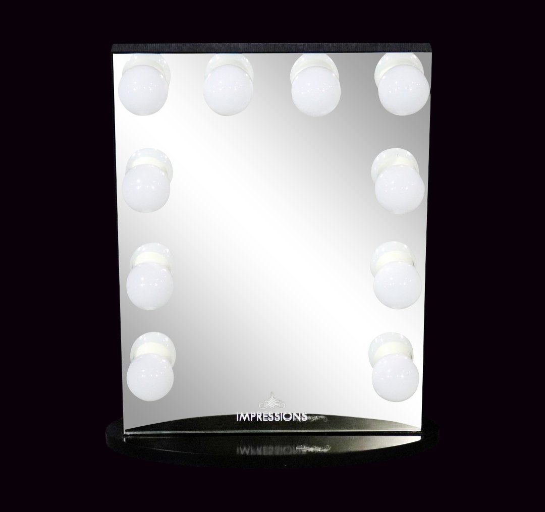 IMPRESSIONS LIGHTED MIRROR: Metal frame. Lighted. Mirrored. Dimmer switch. 26 3/4" h x 21 7/8" w x 6 1/2" d.