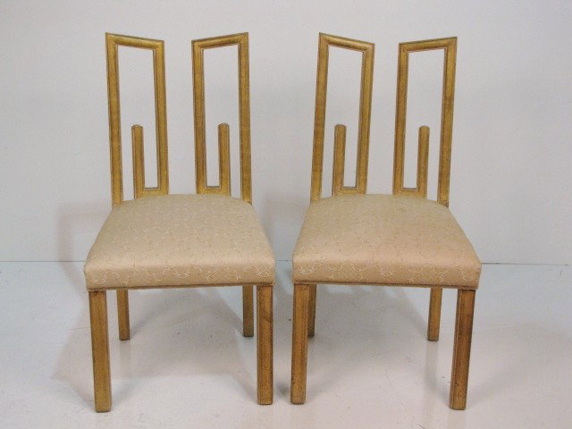 Pr. JAMES MONT GILT WOOD DINING CHAIRS: Distressed gilt. Very good condition. 36"h. x 18 1/2"w. x 22"d.