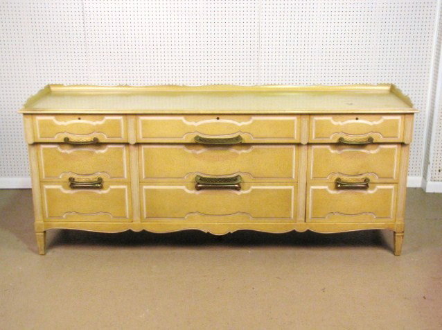 GROSFELD HOUSE YELLOW PAINTED TRIPLE DRESSER: Very good condition with large blemish on top. 35 1/2"h. x 84"w. x 22"d.