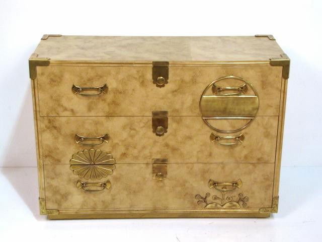 MASTERCRAFT FAUX PARCHMENT CAMPAIGN CHEST: Brass mounts. Labelled on back. Very good condition. 31 1/4"h. x 43"w. x 16 1/4"d.