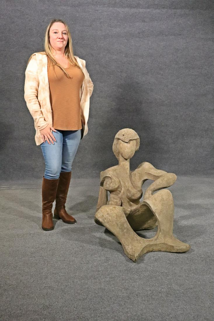 CLAUDE BRICE RECLINING STONE FIGURE: Stone. Deacquisition from Haverford College Foundation. 31" h x 28" w x 41 1/2" d.