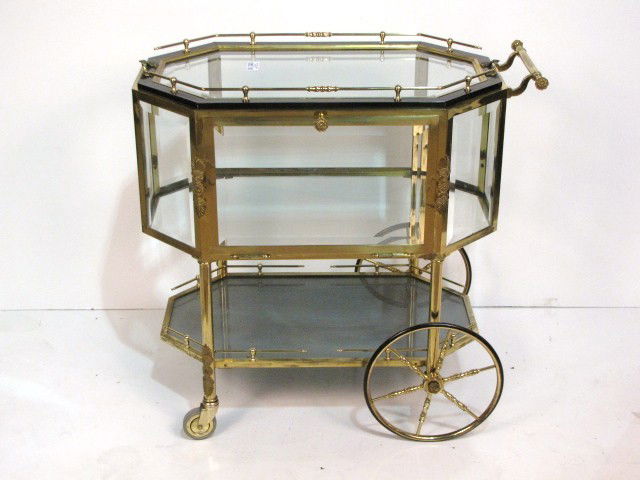 NEOCLASSICAL STYLE BRASS & BEVEL GLASS BAR CART: Very good condition. 31 3/4"h. x 33 1/2"w. x 20 3/4"d.