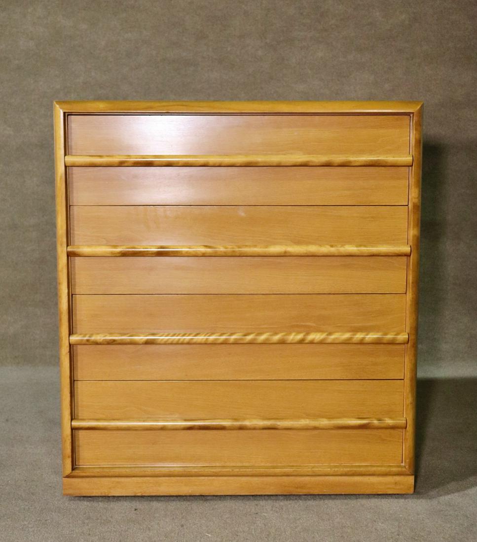 TH ROBSJOHN GIBBINGS FOR WIDDICOMB TALL DRESSER: Wood. 4 dovetailed drawers. On casters. 39 3/4" h x 35 1/8" w x 20 1/2" d.
