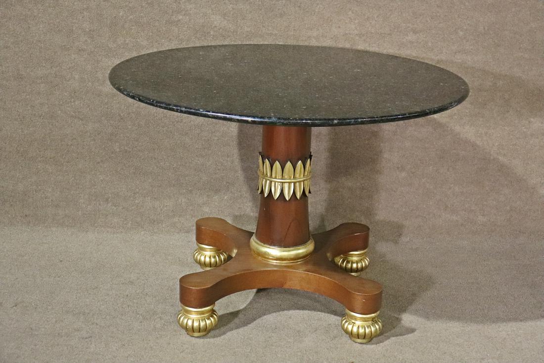 MARBLE TOP CENTER TABLE: Wood base. Painted accents. Granite top. 29 5/8" h x 41 7/8" diameter.