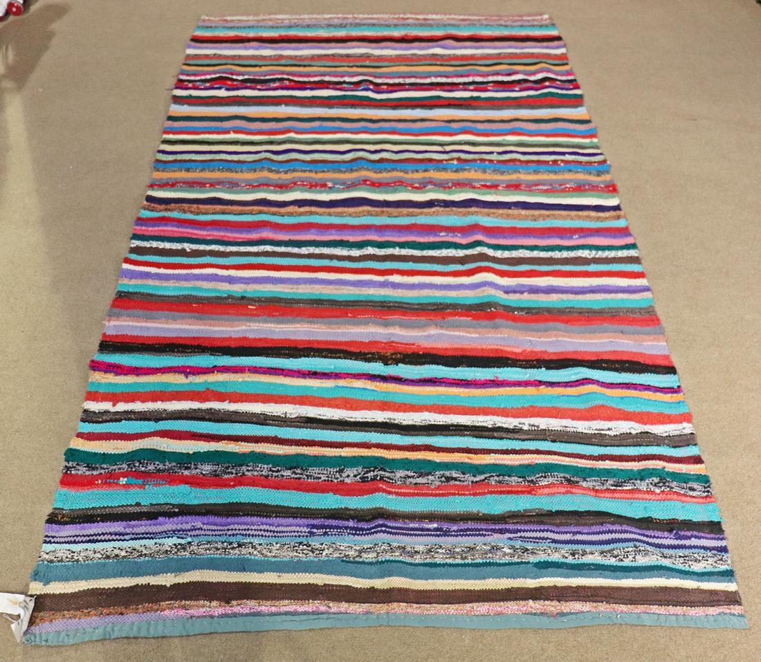 MID CENTURY MODERN MULTICOLORED RUG: Multicolored. 120" l x 67" w.