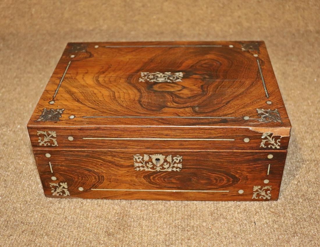 ROSEWOOD MOTHER OF PEARL SEWING BOX: Vladimir Kagan's personal furniture from estate. Rosewood. Mother of Pearl. Lined interior. Flip down compartment. 4 5/8" h x 11" w x 8" d.