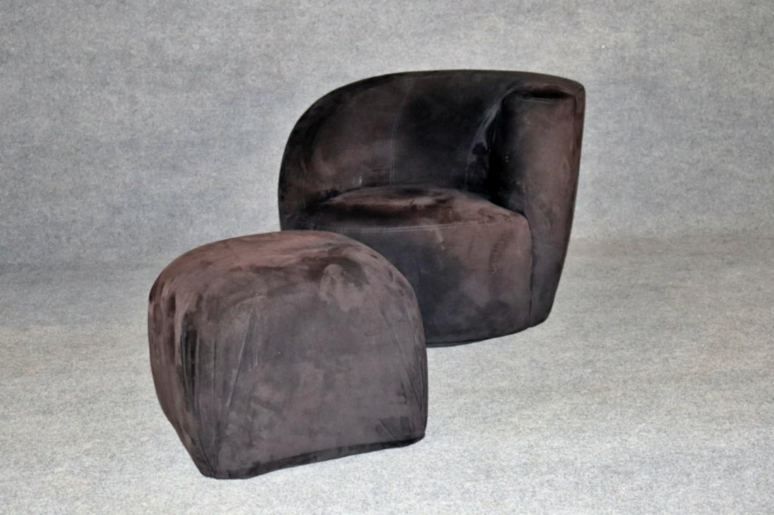 SIGNED VLADIMIR KAGAN FOR LAZAR NAUTILUS SWIVEL LOUNGE CHAIR & OTTOMAN: Black suede upholstery. Swivels. Chair measures 27" h x 36" w x 34 1/2" d. Seat height 16 1/2". Ottoman measures 17 1/4" h x 21 1/2" w x 21 1/2" d.