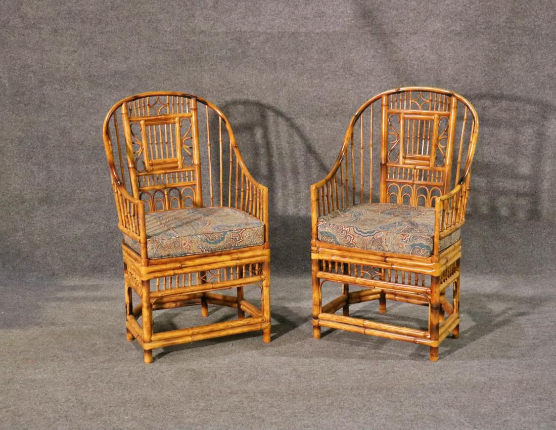 PAIR BRIGHTON PAVILION BAMBOO & CANE ARMCHAIRS: Bamboo. Cane. Upholstered cushion. 40 3/4" h x 21 3/4" w x 22" d. Seat height without cushion 17" and 20" with cushion.