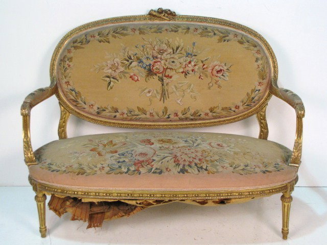 ANTIQUE FRENCH GILT AUBUSSON SOFA: Finely carved gilt frames. Wear to gilt. Some soiling to aubusson seat. 39 3/4"h. x 23 1/4"w. x 24"d.