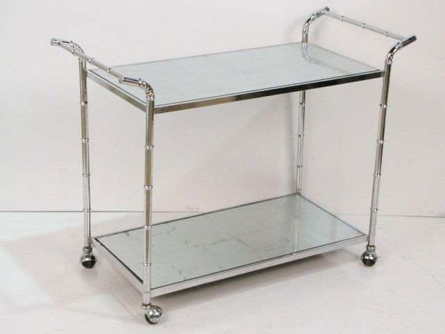 CHROME BAMBOO FORM MIRRORED TEA CART: Silver gilt glass shelves. Excellent condition. 30 1/4"h. x 40"w. x 18"d.