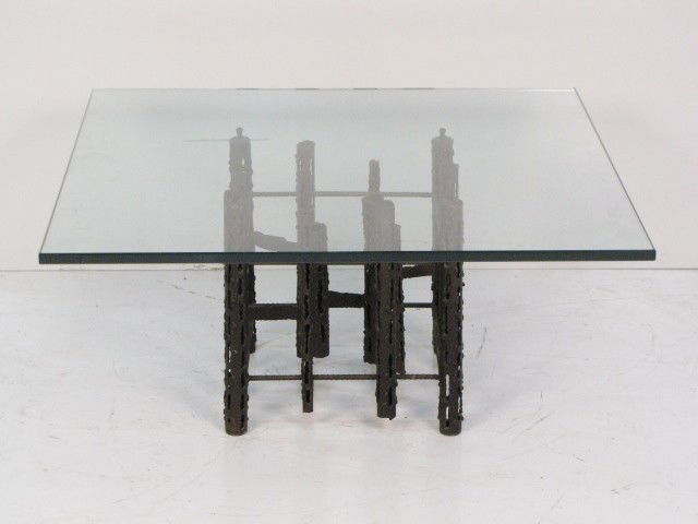 WELDED STEEL COFFEE TABLE MANNER of PAUL EVANS: Welded steel. Glass top. Very good condition. 17"h. x 36"w. x 36"d.
