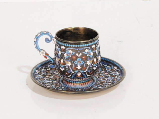 ENAMELLED RUSSIAN SILVER CUP AND SAUCER: Hallmarket 88 and HA. Very good condition. Cup measures 2 3/4"h. Saucer measures 4 5/8"diam.