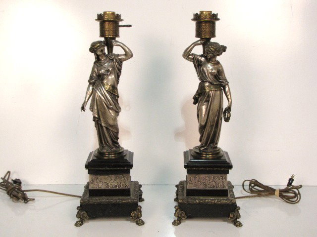 Pair MOREAU BRONZE CLASSICAL FIGURE LAMPS: Signed Moreau Aine. Silverplated bronze. Black marble bases. Very good condition. 21 1/2" high.