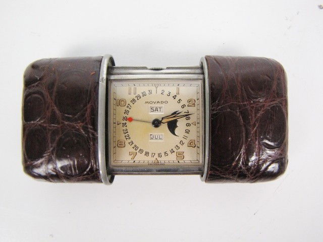 MOVADO MOON FACE TRAVEL CLOCK: Very good condition. 1 3/8" x 1 7/8" x 5/8"