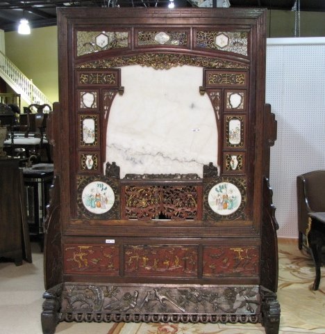 ANTIQUE 8 ft. CHINESE CARVED SCREEN w/ PORCELAINS: Large marble center panel. Hand painted porcelain plaques. Red paint and gilt highlights. Very good condition. 96"h. x 70"w. x 37"d.