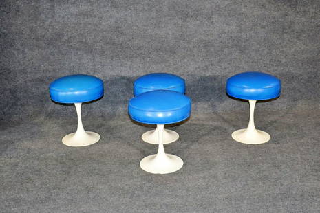 4 MAURICE BURKE TULIP STOOLS AFTER EERO SAARINEN: Circa 1960. Upholstered seats. Metal base. 19" h x 16" diameter.