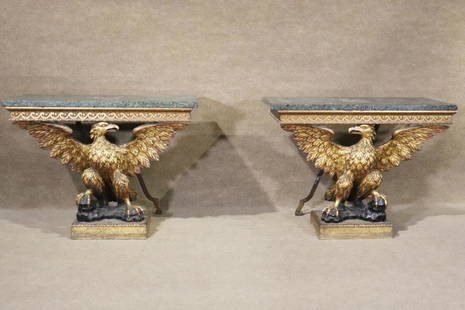 PAIR WILLIAM KENT STYLE GEORGIAN CONSOLES: From The Philadelphian. Carved wood. Gilt. Eagle figural. Marble top. Iron brackets on back. 32" h x 43 1/4" w x 20 3/4" d.