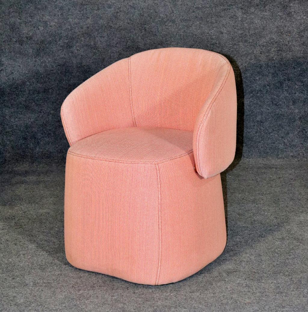 HAWORTH UPHOLSTERED CHAIR/OTTOMAN: Upholstered. Back piece folds down to make an ottoman. 30 3/8" h x 25 3/4" w x 24 3/4" d. Seat height 19".