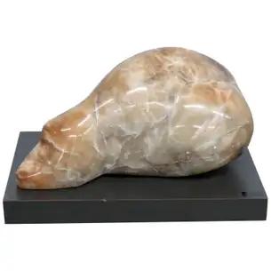 LISSY DENNETT LARGE ORGANIC ALABSTER SCULPTURE: Alabaster. Ebonized base. Sculpture measures 13" h x 27" w x 15" d. Ebonized base measures 3" h x 30" w x 18" d. Complete measures 18" h.