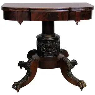 ANTIQUE 1820'S MAHOGANY DUNCAN PHYFE STYLE CARD TABLE: Mahogany. Flip top. Claw feet. Casters. 31 3/4" h x 36" w x 19 1/4" d.
