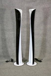 PAIR OF ARTEMIDE CADMO FLOOR LAMPS: Italian. Label on bottom. 68 1/4" h x 13" diameter.