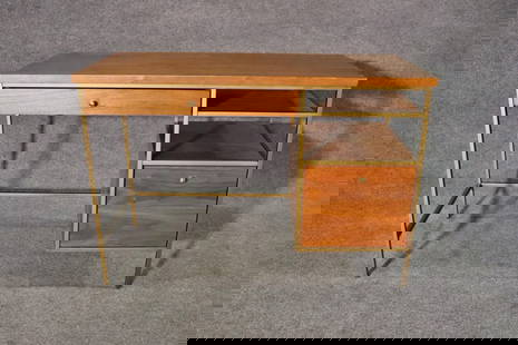 PAUL MCCOBB STYLE DESK: Walnut. Plated frame. 1 drawer on left. 1 file cabinet drawer on right. 1 shelf on right above filing cabinet drawer. 30 1/4" h x 44 x 20 1/8" d.
