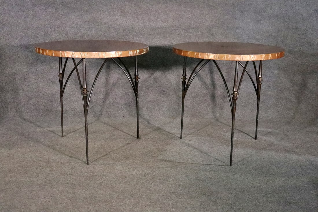 PAIR MCM COPPER WRAPPED CENTER TABLES: Cooper wrapped. Metal base. 30 1/4" h x 31" diameter.