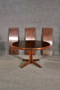 JOHN WIDDICOMB DINING TABLE: John Widdicomb. Round. 29"h x 48 1/4" diameter. 3 - 16 1/4" leaves.
