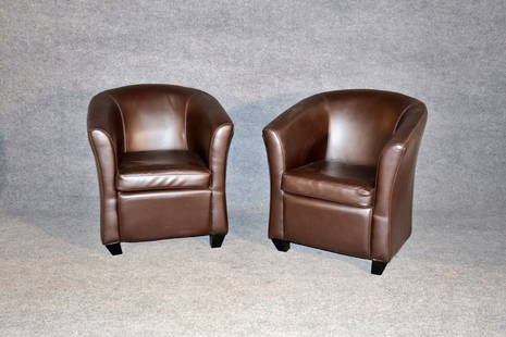 PAIR MODERN LEATHER CLUB CHAIRS: Leather upholstery. Wood legs. 32" h x 28" w x 24 1/2" d. Seat height 19".