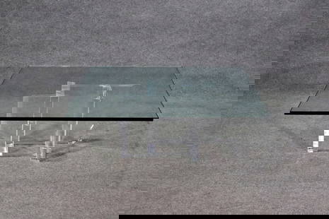 GARY GRUTTERMAN ATTRIBUTED LUCITE & GLASS COFFEE TABLE: Lucite base. Glass top. 16 1/2" h x 42 1/8" square.