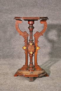 VICTORIAN CARVED PEDESTAL: Walnut with burl walnut top. Ebonized accents. 36 3/8" h x 21 1/2" w x 18 1/2" d.