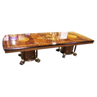 ITALIAN GREEK KEY INLAID FLAME MAHOGANY DINING TABLE: Mixed woods. Inlaid. Flame mahogany veneer. Bronze and ebonized accents. 30" h x 123 1/2" w x 51" d.