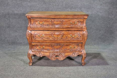 COUNTRY FRENCH 3 DRAWER COMMODE: Walnut. 3 drawers. Metal hardware. Carved. 33" h x 37" w x 20" d.