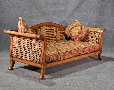 SIGNED RALPH LAUREN CANE SOFA: Walnut. Cane back seats and sides. Upholstered cushion. Signed. 38 3/8" h x 96 1/4" w x 38 7/8" d. Seat height 17 3/4" (with cushion).