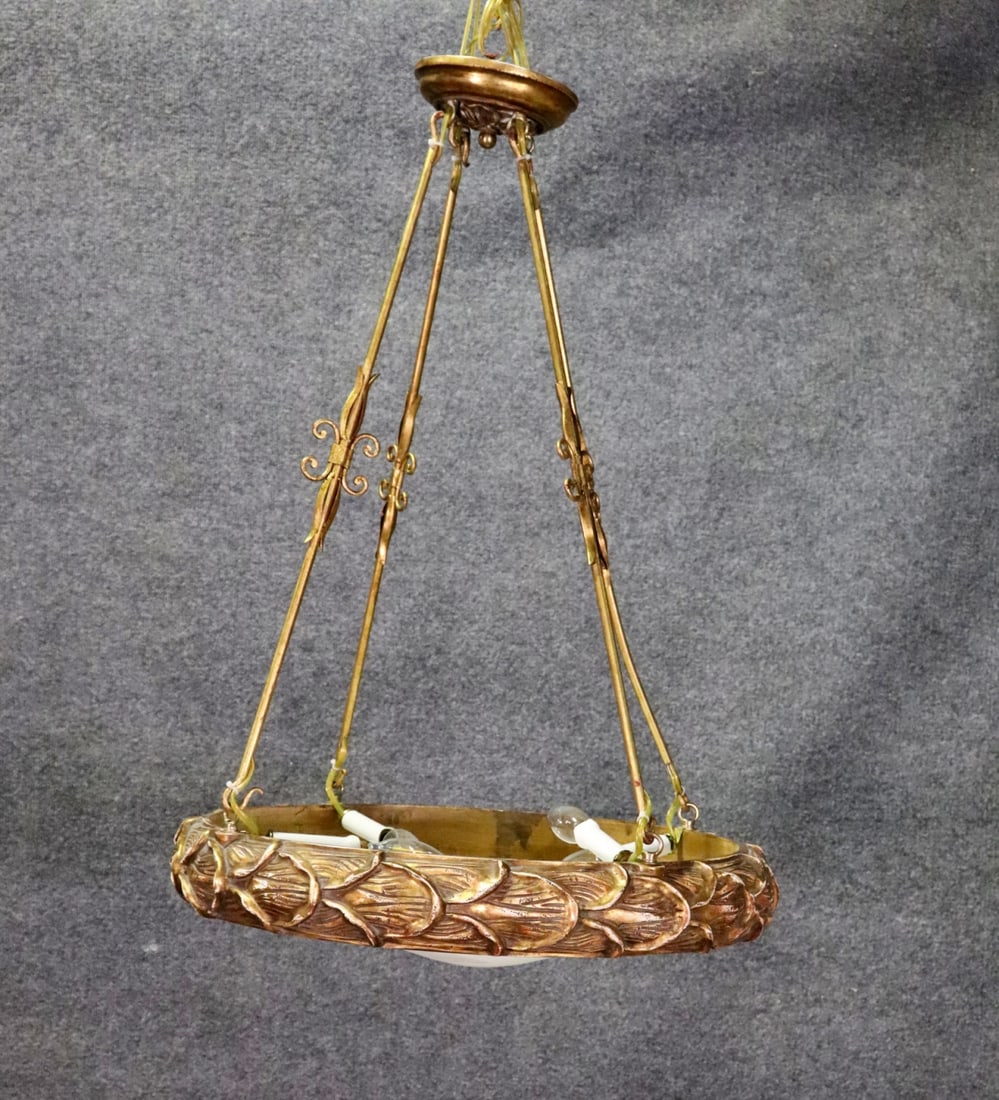 REGENCY STYLE GILT CHANDELIER: Gilt. Some form of composition. Metal arms. Milk glass shade. 32 1/2" h x 25" diameter.