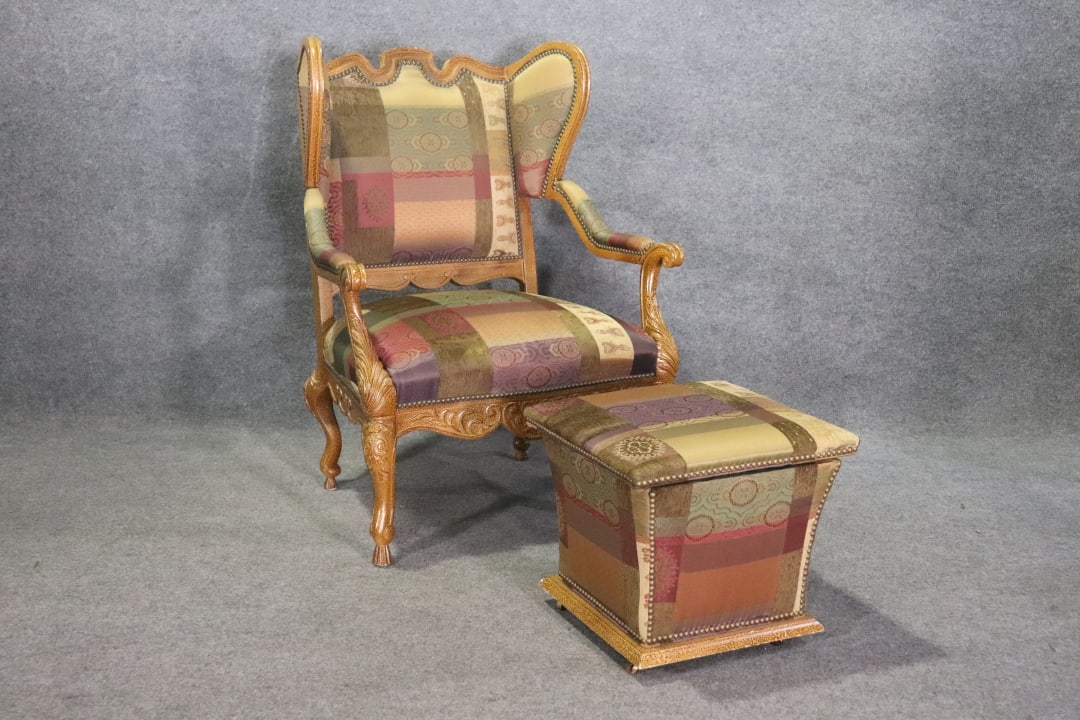 CENTURY FURNITURE ARM CHAIR & OTTOMAN: Nail head trim. Upholstered. Ottoman opens. Chair measures 34 1/4" h x 33 1/4" w x 29 1/2" d. Seat height 21". Ottoman measures 18" h x 18 3/4" square.