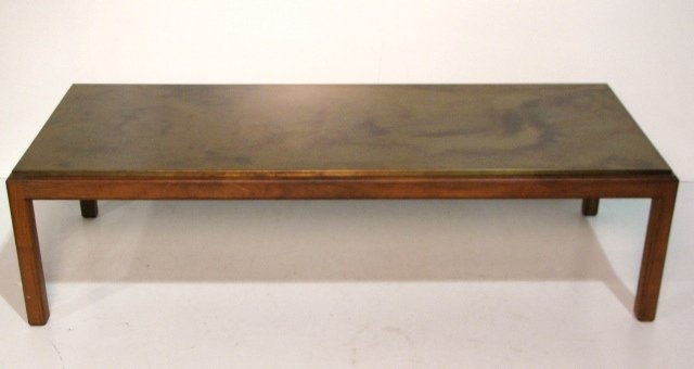 MODERN TEAK COFFEE TABLE: Faux burnished copper top. Very good condition. 16 1/4"h. x 60"w. x 23 3/4"d.
