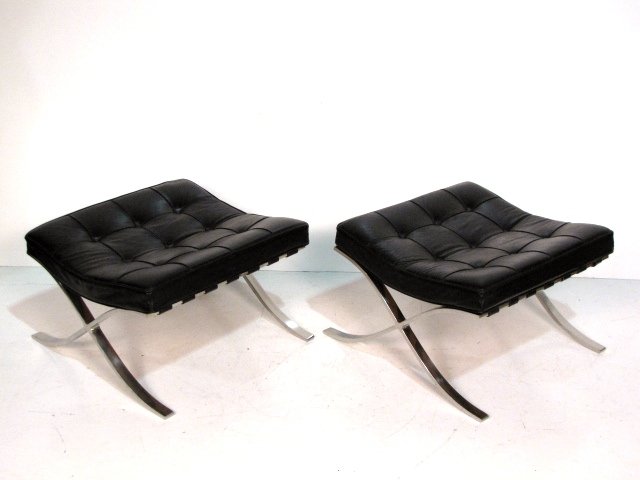 Pair MIES VAN DER ROHE KNOLL BARCELONA OTTOMANS: Very good condition with one broken leather strap. 14 1/2"h. x 23 1/2"w. x 22"d.
