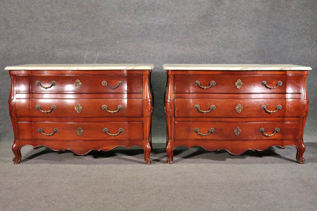 PAIR JOHN WIDDICOMB MARBLE TOP COMMODES: Marble. Walnut. 34" h x 49" w x 23" d.