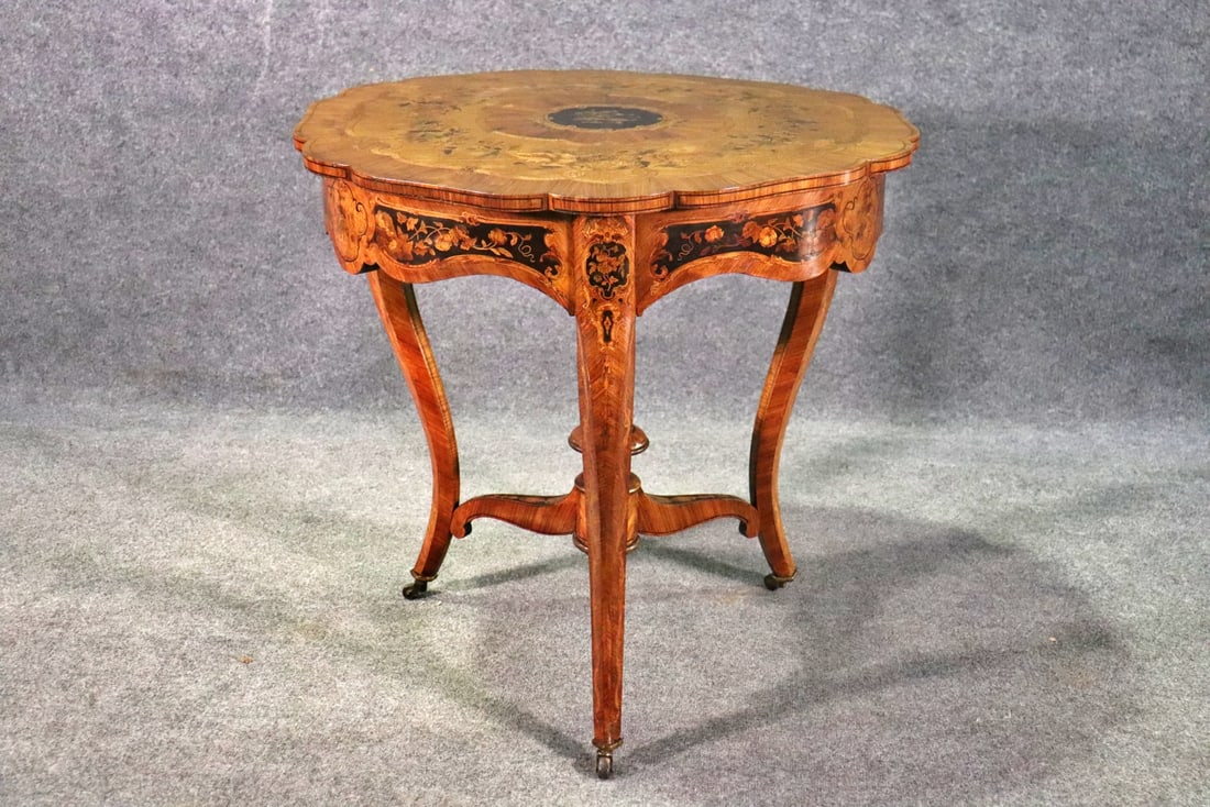 LOUIS XV STYLE MARQUETRY INLAID CENTER TABLE: Inlaid. 30 3/4" h x 32 5/8" diameter.