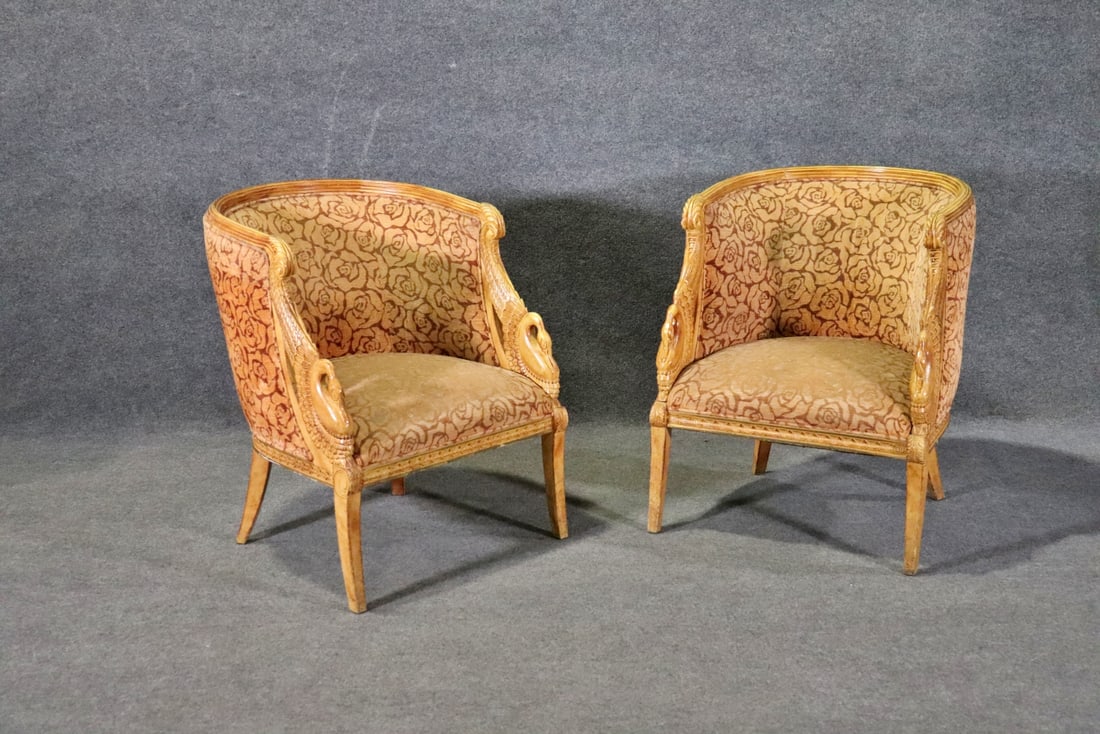 PAIR FRENCH SWAN FIGURAL LOUNGE CHAIRS: Swan figural carved frames. Upholstered. 33" h x 26 1/4" w x 29" d. Seat height 17 1/2".