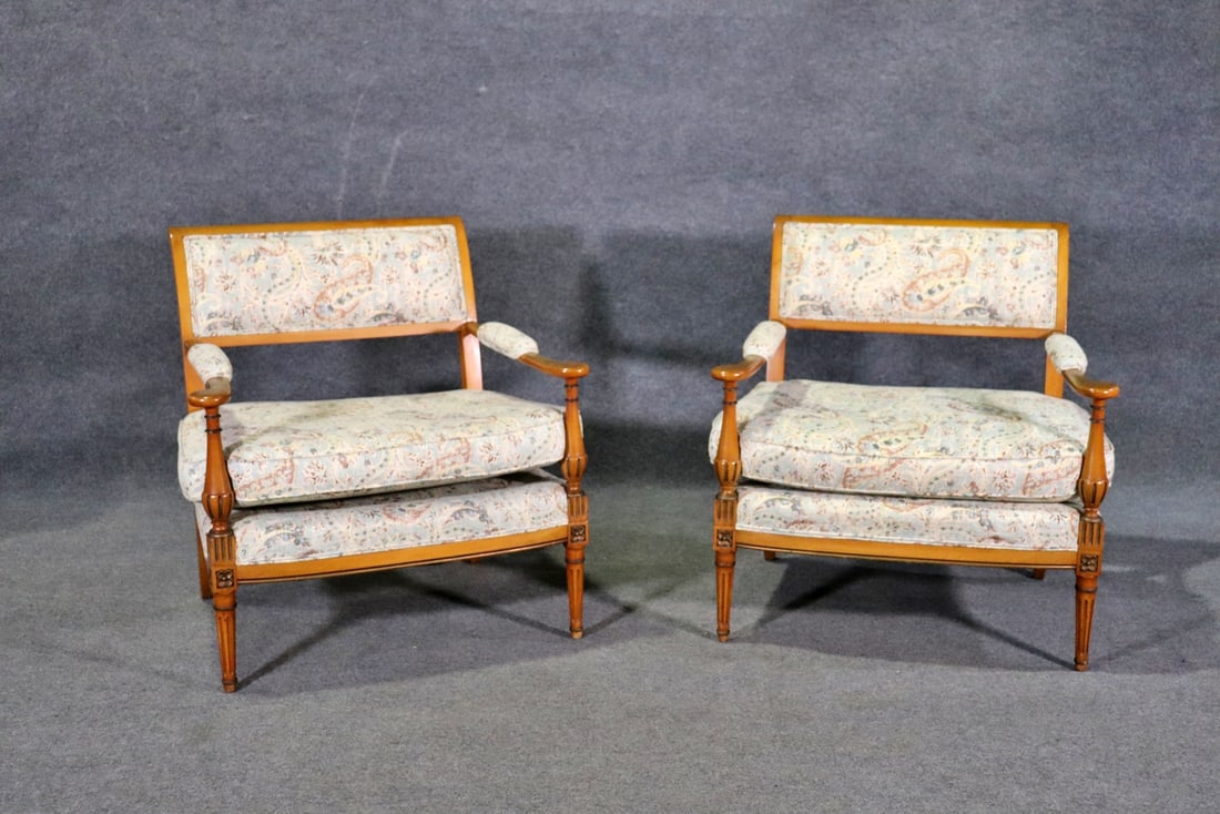 PAIR LOUIS XVI STYLE OVERSIZED FAUTEUILS: Carved wood frames. Upholstered. 32" h x 32" w x 28" d. Seat height 18".