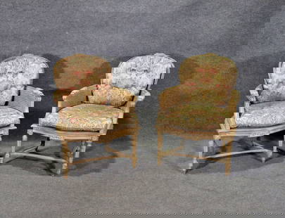 PAIR LOUIS XVI STYLE CANE ARM CHAIRS: Distressed. Cane. Carved. Upholstered arm rests. Removable upholstered cushion. Upholstered cushions on backs attached. 36" h x 26" w x 30" d. Seat height 15".