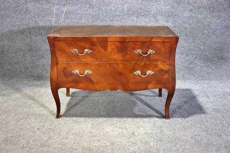 ITALIAN LOUIS XV STYLE OLIVEWOOD COMMODE: Olivewood. 2 drawers. Metal hardware. 32" h x 43 1/4" w x 18 5/8" d.