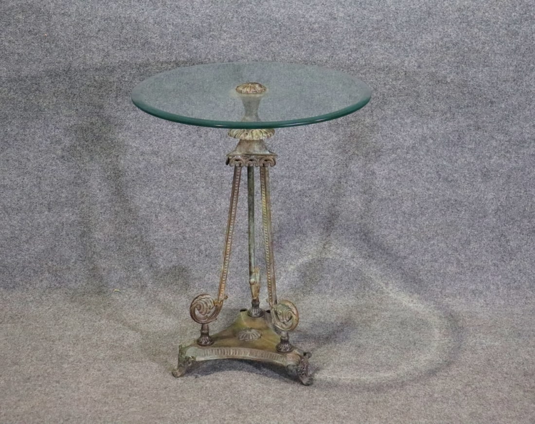 GLASS TOP GUERIDON TABLE: Mixed metal. Glass top. 25 1/2" h x 20" diameter.