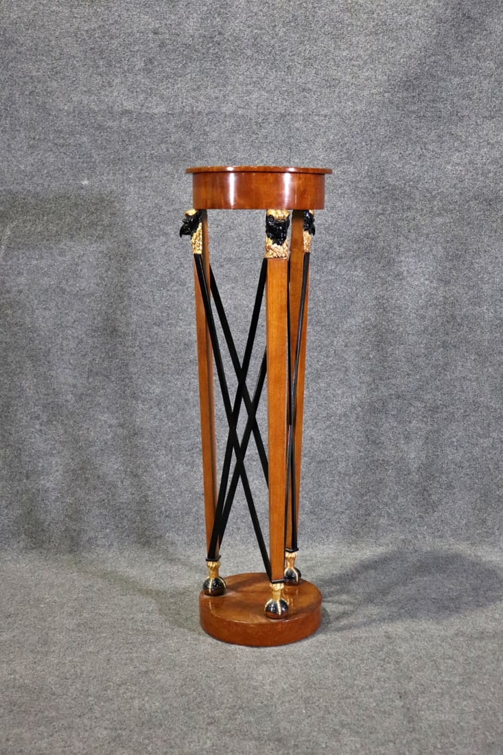 ITALIAN FIGURAL PEDESTAL: Wood. Ebonized. Figural bird. Gilt accents. 42 3/4" h x 14 1/2" diameter.