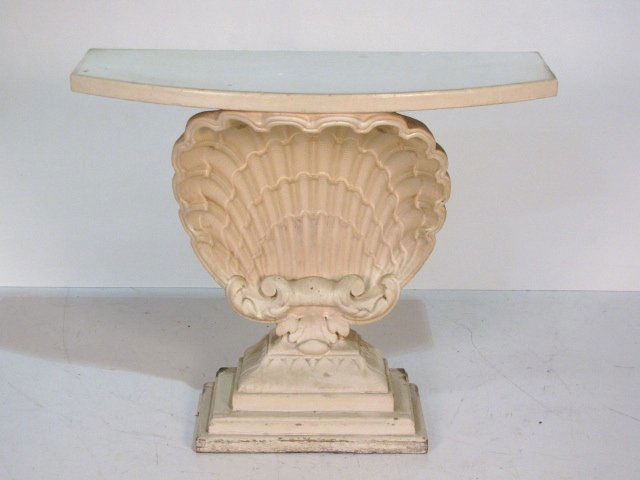 SHELL FORM CONSOLE TABLE: Plaster shell. Overpainted. 33 1/4"h. x 38"w. x 14"d.