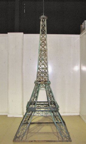 10ft. ANTIQUE IRON EIFFEL TOWER MODEL: Good condition. 118"h. x 45 3/4"sq.