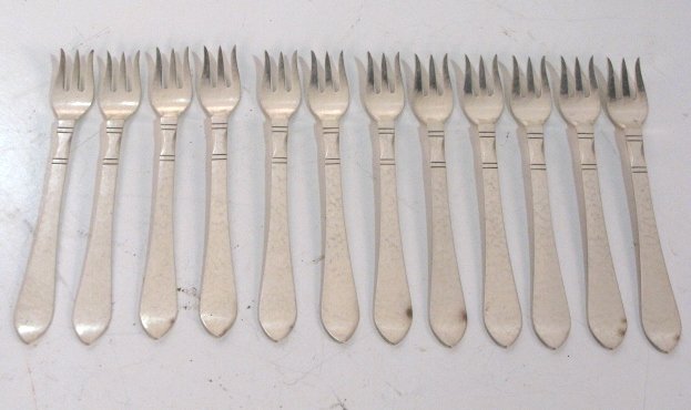 12 GEORG JENSEN STERLING SILVER 5 7/8" COCKTAIL FO: No monogram. Very good condition. 10.17 troy oz.